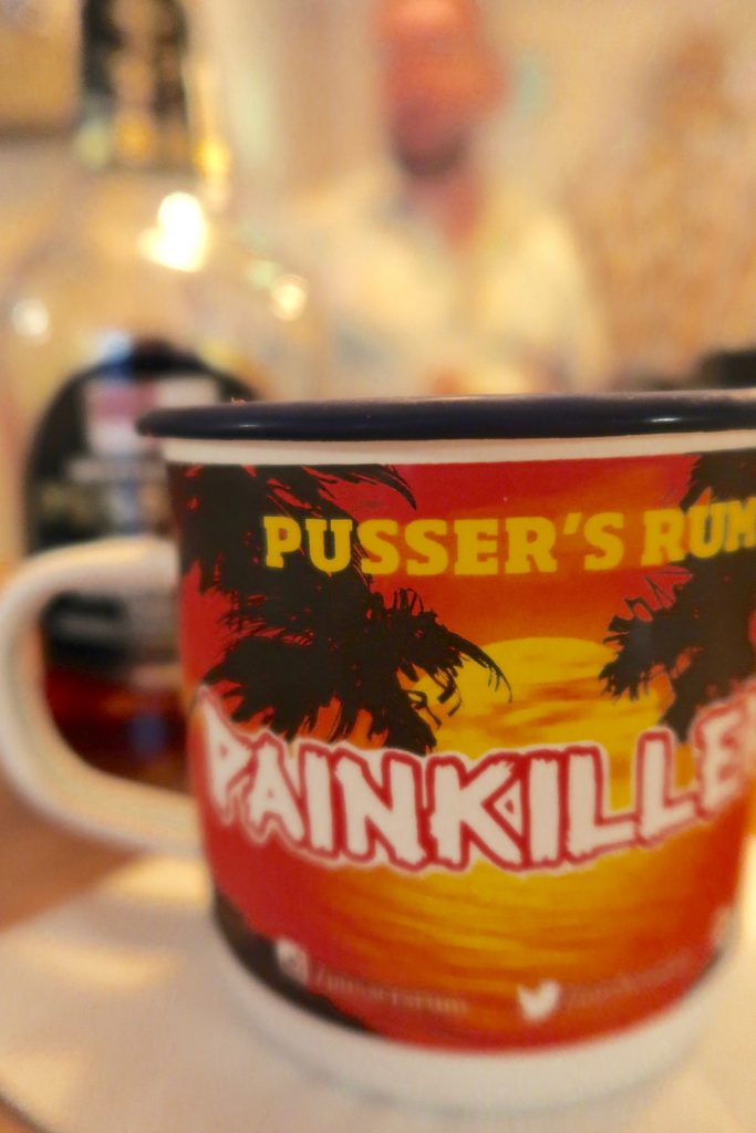 Painkiller in a traditional painkiller rum mug at Marigot Bay bar and cafe in Altrincham