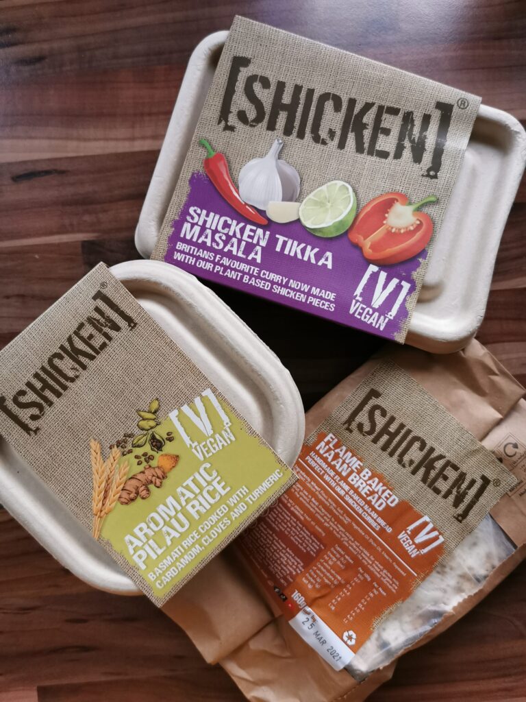 Shicken tikka masala, pilau rice and naan bread in its plastic free packaging